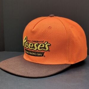 Reese's Pieces Men's Orange/Brown Flat Bill Snapback Hat .